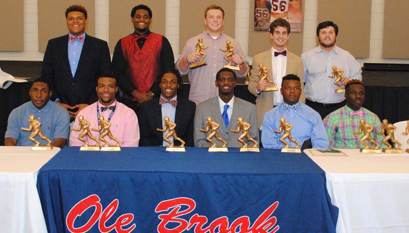 Daily Leader / Marty Albright / Brookhaven Panthers receiving special awards at Monday night's Ole Brook Football Banquet were (from left, seated) Greg Watts, Therrell-Tanner Award, All-Region 3-5A; Dedric Smith, Most Outstanding Defensive Player, Stan Patrick "Boom" Award, All-Region 3-5A; Willie Bates, Team Captain, All-Region 3-5A; Darrian Wilson, Scholastic Award, Team Captain, All-Region 3-5A; Jordan Blackwell, Most Outstanding Defensive Back; Thomas Poole, Most Outstanding Offensive Back, Most Outstanding Offensive Player, All-Region 3-5A; (standing) Wanya Morris, Panthers, All-Region 3-5A, MAC All-State; Brandon Rice, All-Region 3-5A, Most Outstanding Offensive Lineman; Stephen Springfield, Most Outstanding Defensive Lineman, All-Region 3-5A; Garrett Smith, Panther and Jordan Nations, Therrell-Tanner Award.