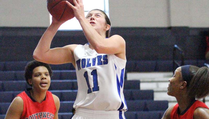 Co-Lin Media / Natalie Davis / Co-Lin's Kelley Allen (11) scores two of her team-high 23 points Monday at Mullen Gymnasium.