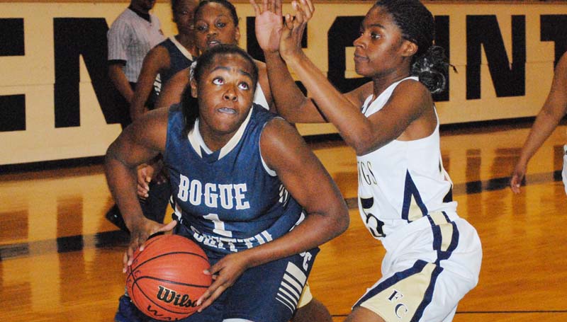 Daily Leader / Marty Albright / Bogue Chitto's Lineka Newson (1) battles in the paint against Franklin County's Shemiah Amos (25) Friday night in Meadville.