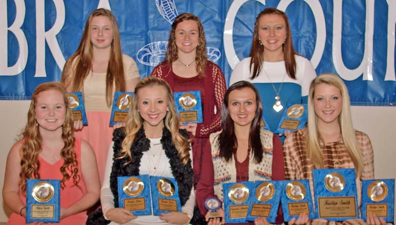 Daily Leader / Tracy Fischer / The Wesson slowpitch softball team was honored during the Cobras' fall athletic banquet. Players receiving awards were (seated, from left) Riley Smith - First Team All District 7-3A; Brooke Jones - Best Defensive Player, First Team All District 7-3A; Cheyenne Gladden- Senior, Most Versatile Player, First Team All District 7-3A; Kaitlyn Smith - Senior, Best Offensive Player, Most Valuable Player, First Team All District 7-3A; (Back) Katie Westbrook - Hustle Award, First Team All District 7-3A; Nikki Guess - Most Improved; Harmoni Ashley - Golden Glove Award, First Team All District 7-3A. (Not pictured - Aurianna Vaughn - First Team All District 7-3A).