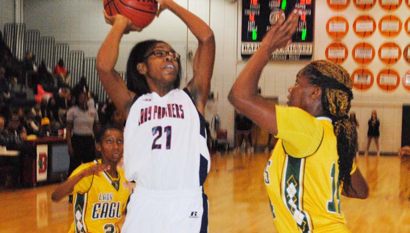 Daily Leader / Marty Albright / Brookhaven's Arnancy Arnold (21) shoots a short jump shot over South Pike's Nakaylis Washington (14) Tuesday night.