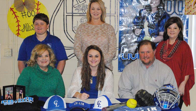Daily Leader / Photo submitted / Brookhaven Academy's Allison Livingston has signed softball scholarship with the Copiah-Lincoln Community College Lady Wolves. Pictured with Allison is her mother Tammy Livingston (left) and father David Livingston. Standing is Jake Livingston (brother), Brookhaven Academy head softball coach Becky Flowers and Laura Livingston.