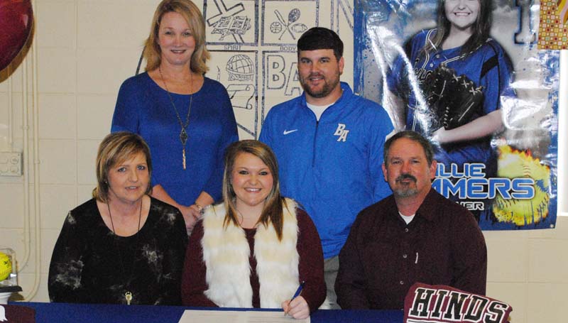 Daily Leader / Marty Albright / Brookhaven Academy's pitcher Alli Summers has signed a softball scholarship to play for the Hinds Community College Lady Bulldogs next year. Pictured with Alli is her parents (from left) Dana and Steve Summers. Standing in the back is Brookhaven Academy coach Becky Flowers (left) and Brookhaven Academy Athletic Director Blake Purvis.