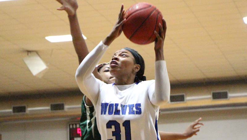 Co-Lin Media / Natalie Davis / Meridian's Andriel Mos (32) tries to defend Co-Lin's Andreal Fleming (31) in women's action Thursday night.