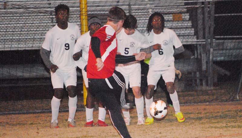 Daily Leader / Marty Albright / Brookhaven's Malik Anton, Adrian Lockwood, Tre Laird and Noah Spears form a wall to defend the goal against Pascagoula Thursday night in boys action at King Field.