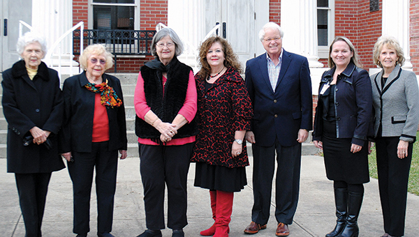 Photo by Aaron Paden / (From left) Mrs. Jim C. Barnett, Dott Cannon, Shirley Estes, Jennifer Jackson, Bill Sones, Suzanne Hirsch and Katherine Bumgarner meet in front of Lampton Auditorum Thursday. Those who attended Thursday’s event are all sponsors who have purchased a brick to help fund the renovation of Elizabeth Cottage.