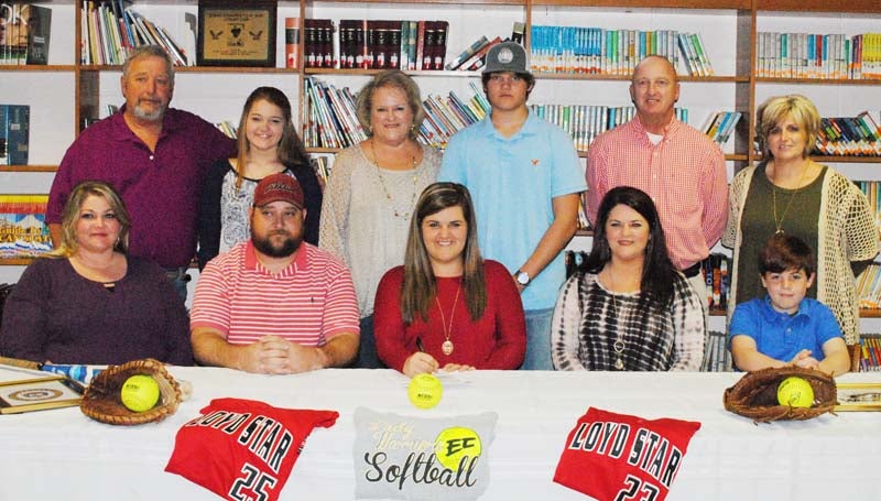 Daily Leader / Marty Albright / Loyd Star's first baseman Ali Gartman has signed a softball scholarship with the East Central Community College Lady Warriors. Pictured with Gartman (seated, from left) is her step mom Shannon Gartman, (father) Brady Gartman, (mother) Lynn Nash and her brother Nash Durr. Standing is grandfather Dinki Gartman, (sister) Lauren Gartman, grandmother Jean Gartman, (brother) Landon Gartman, Loyd Star assistant coach Bo Case and Loyd Star coach Jan Delaughter. Not pictured were grandfather Billy Nash and grandmother Shirley Nash.