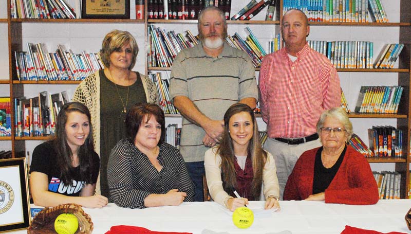 Daily Leader / Marty Albright / Loyd Star's outfielder Julie Smith has signed a softball scholarship with the East Central Community College Lady Warriors. Present for the ceremony were (seated, from left)) Emily Smith (sister), Janet Smith (mother) and grandmother Yvonne Britt. Standing is Loyd Star coach Jan Delaughter, Gary Smith (father) and Loyd Star assistant coach Bo Case.