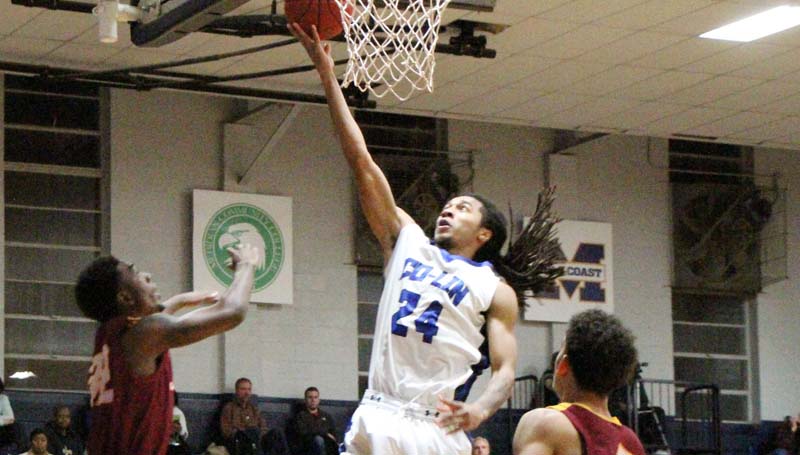 Co-Lin Media / Natalie Davis / Co-Lin's Donte' Watson (24) drives in for the layup against Jones County Thursday night.