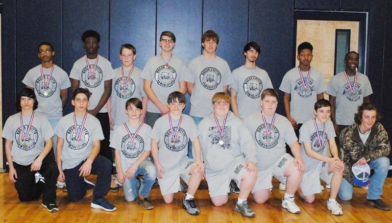 Daily Leader / Photo submitted / Bogue Chitto's powerlift team captured its seventh straight division crown Friday night at Bogue Chitto's basketball gymnasium. Members of the team are (from left, kneeling) Chris Carter, Michael Rayborn, T.J. McCaffrey, Reid Smith, Davis Hart, Hugh Greer, Evan Kysar, Jacob Cartwright; (standing) Demarcus Godbolt, Sherman Jackson, Kysar Holmes, Chaney Rutland, Shawn Buffington, Kody Halford, Dee Dillon and Terrance Morgan.