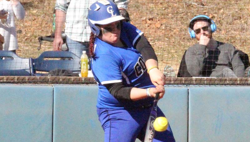 Co-Lin Media / Lucas Calvert / Co-Lin catcher Jessica Crum hits a home run to straight away centerfield in Sunday's softball action against Itawamba.