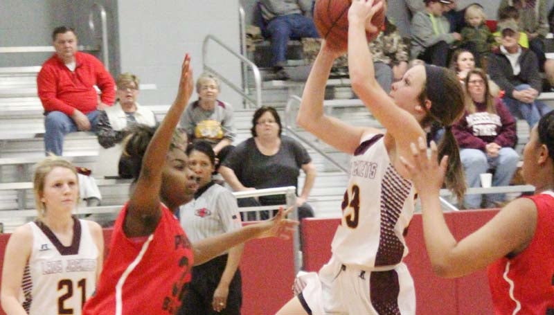 Daily Leader / Patty Emfinger / Enterprise Carlee Nations (23) glides through the lane to score a basket Tuesday night against Prentiss.