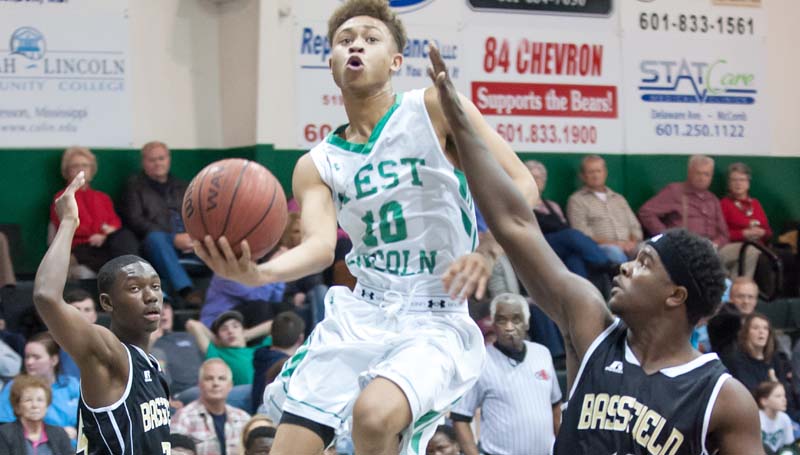 Daily Leader / Teresa Allred West Lincoln's Ronnie Edwards (10) makes a acrobatic layup against Bassfield Tuesday night at Jack Case Gymnasium.