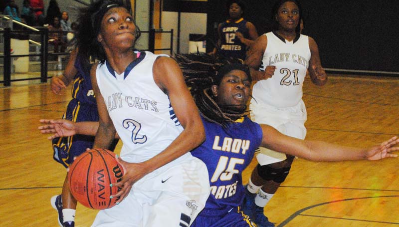 Daily Leader / Marty Albright / Bogue Chitto's Zariah Matthews (2) drives to the basket to score a layup against Mount Olive Thursday night.