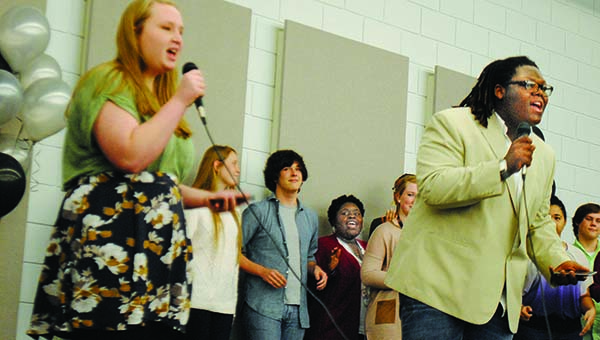 Photos by Aaron Paden / Mississippi School of the Arts junior vocalists perform during the annual Senior Prom hosted by the Jimmy Furlow Senior Center at the FEMA Building Monday.