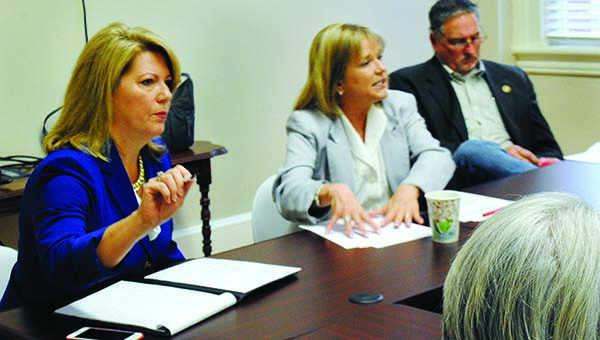 Photo by Aaron Paden / Sen. Sally Doty and Reps. Becky Currie and Vince Mangold discuss education bills with their constituents Monday.