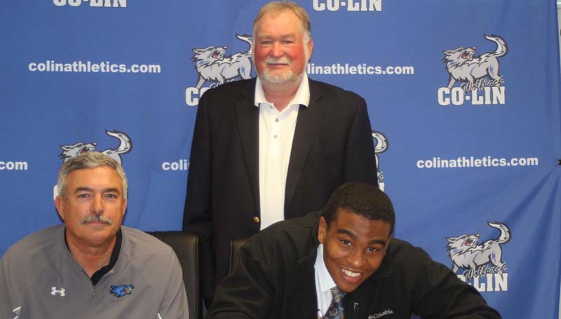 Co-Lin Media / Natalie Davis / Copiah-Lincoln Community College linebacker Marico Paige of Walls (Wesson) has signed with the Murray State University Racers. Paige (6-2, 225), who prepped at Lake Cormorant High School, with tied for second on the team with 47 tackles, 2 sacks, 2 tackles for loss, 2 forced fumbles, and 1 fumble recovery this season. He was named Mississippi Association of Community and Junior College Second Team All-State. Pictured with Paige are Co-Lin head coach Glenn Davis (seated left) and Tony McInnis of Wesson (standing). The Wolfpack finished the 2015 season ranked No. 4 in the NJCAA poll.