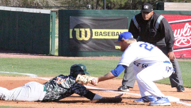 Co-Lin Media / Co-Lin's first baseman Kody Smith puts the tag on Lincoln Trail's Cory Chambliss in Friday night action at Sullivan Field.
