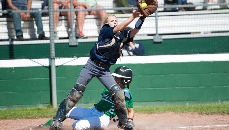 Daily Leader / Teresa Allred / West Lincoln's Sara Jane Doty (2) slides in safely to home plate while Bogue Chitto catcher Kayci Beth Wallace (19) stretches to make the catch in softball action Saturday.