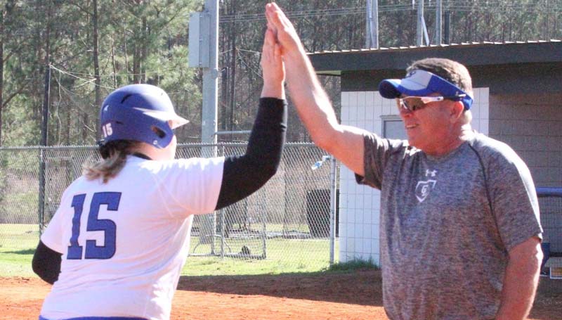 Co-Lin Media / Natalie Davis / Co-Lin's Trevlyn Scott is greeted at home plate by her teammates after hitting a 2-run home run Friday.