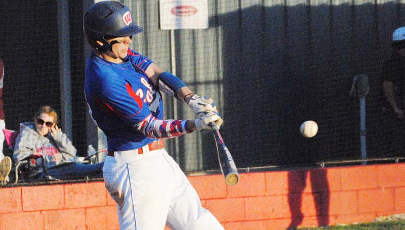 Daily Leader / Marty Albright / Wesson's Jeremy Smith collects a big hit in Friday's action against South Pike.