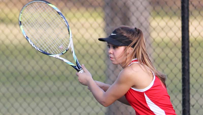 Daily Leader / Katie Furr / Loyd Star's Ashlyn Locke prepares to return a serve in tennis action against West Lincoln Monday at the Brookhaven Country Club.