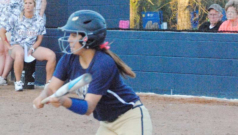 Daily Leader / Marty Albright / Bogue Chitto's Cherie Savoie prepares to lay down a slap bunt against Lawrence County in Monday softball action.