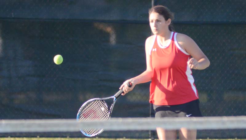 Daily Leader / Marty Albright / Loyd Star's Morgan Brister returns a serve in Girls No. 2 Doubles action against Lawrence County.
