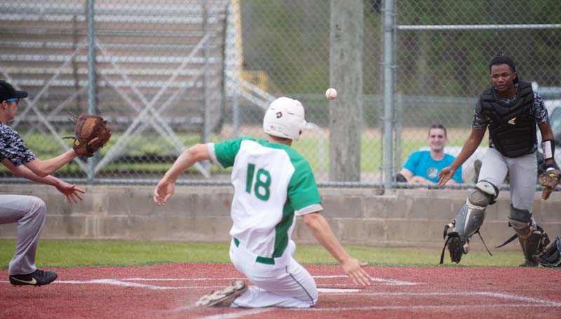 Daily Leader / Teresa Allred / West Lincoln's Lofton Sills (18) slides safely into home plate on a pass ball against Amite County Wednesday night.