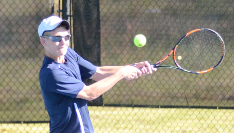 Daily Leader / Photo submitted / Brookhaven's Will Moak returns a serve in boys No. 1 doubles tennis action against Lawrence County.
