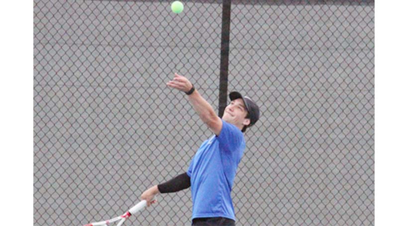 Co-Lin Media / Natalie Davis / Co-Lin's Will Pennington prepares to make a serve to Meridian in men's juco tennis action.