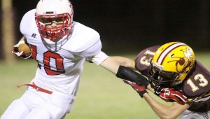 DAILY LEADER / JONATHON ALFORD  Enterprise defender Wesley Blazier (13) makes a tackle in a 2015 football game. 