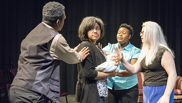 Photos by Julia Miller / Paulina, center, rescues Hermoine’s daughter from prison and demands an audience with King Leontes.