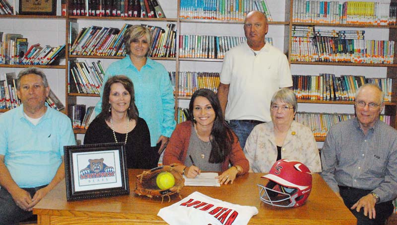 Daily Leader / Marty Albright / Loyd Star outfielder Madison Jones has signed a letter of intent to play softball for the Southwest Community College Lady Bears next year. Pictured with Jones are (from left) father Stan Jones, mother Debbie Jones and grandparents Dorothy Wheat and Charles Wheat, (standing) Loyd Star coach Jan Delaughter and Loyd Star assistant coach Bo Case.