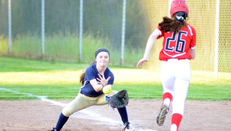 Daily Leader / Marty Albright / Bogue Chitto's second baseman Karly Leake secures the out at first base as Loyd Star's runner Meagan Poole hustle to beat the play Monday night.