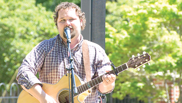 Photos by Alex Jacks / Tony Norton performs at “Music and Art at Trinity Park” on Thursday at Trinity Park, a rarely-used venue connected to the Church of the Redeemer on 224 West Monticello St. Next week’s performance will be at noon Thursday by Andi Cotton and Tyler Bridge.