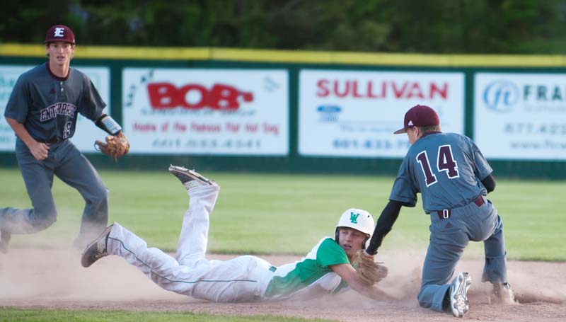 Daily Leader / Teresa Allred / West Lincoln's Austin Burris drives back to second base safely to beat the tag of Enterprise's Brady Watts (14) Friday night.
