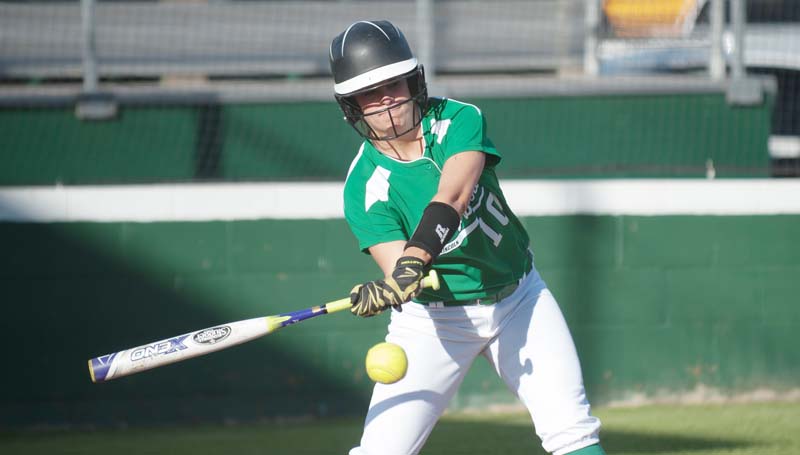 Daily Leader / Teresa Allred / West Lincoln's Layton Sills (10) provides a big hit against Prentiss Friday night.