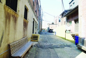 Photos by Aaron Paden /  Seating and lights have already been placed in the alley behind Lemanedi Arts and Interiors, but there is still plenty of work left to be done. 