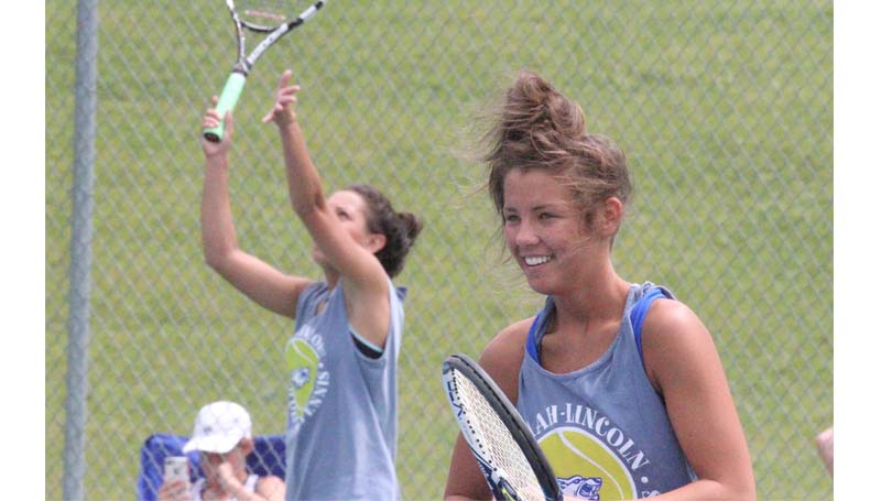 Co-Lin Media / Natalie Davis / Co-Lin's Madison Warren is ready as her partner Brandi McInnis serves in girls double action against Northwest.
