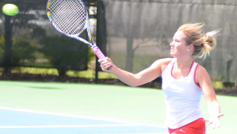 Daily Leader / Marty Albright / Brookhaven's Sarah Grace Evans makes a great save at the net against Picayune in girls singles action at Brookhill.