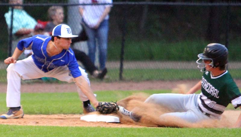Daily Leader / Sherylyn Evans / Brookhaven Academy Conner Clyde Smith tags out a Natchez Cathedral runner stealing third base Tuesday night at Harold Williams Ballpark.