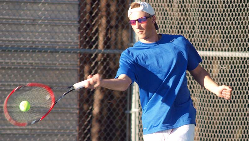 Daily Leader / Tracy Fischer / Wesson's Logan Channell makes a good return in mixed doubles action against Philadelphia Wednesday.