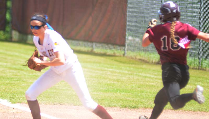 Daily Leader / Marty Albright / Enterprise first baseman Haley Nations records the out before Clarkdale's runner Nikki Boutwell could reach Saturday.