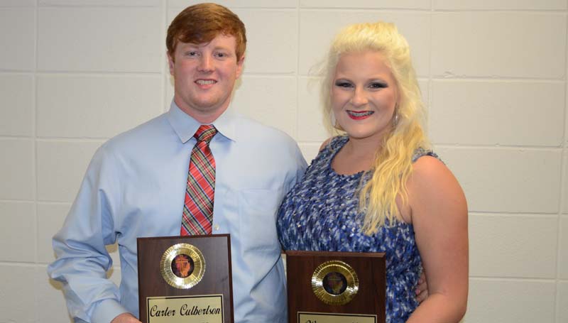 Daily Leader / Marty Albright / Brookhaven Academy seniors (from left) Carter Culbertson and Whitney Moak received Cougar Leadership award honors in Monday's athletic banquet.