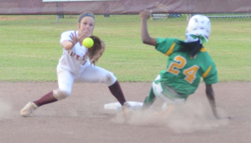 Daily Leader / Marty Albright / Enterprise shortstop Carlee Nations prepares to tag out Taylorsville runner Miracle Crosby (24) sliding into second base Tuesday night at Jerry Coon Field.