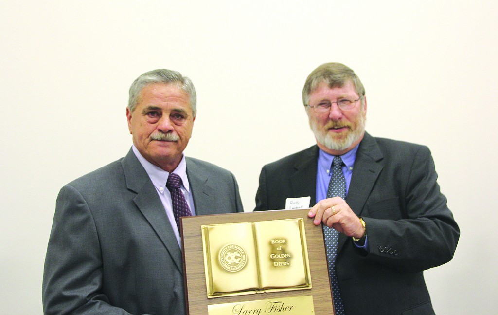 Photo by Alex Jacks/ Larry Fisher was honored with the Golden Deeds award by the Brookhaven Exchange Club Friday night.