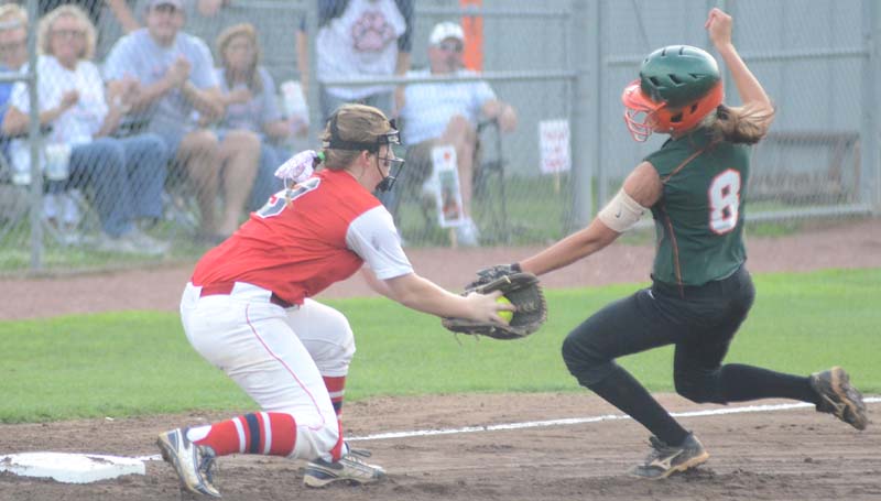 Daily Leader / Marty Albright / Brookhaven's Jadeyn Fuller tags out West Harrison runner Lauren Jackson (8) sliding into third base Monday night at the Lady Panthers softball complex.