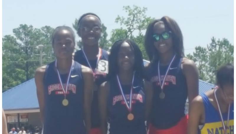 Daily Leader / Photo submitted / Brookhaven's 4x800 relay team members of Asia Byrd, Miyah Miller, Ayanna McNairy and Arnancy Arnold made history for the Lady Panthers in winning gold.
