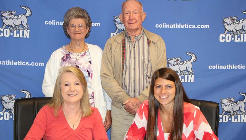 Co-Lin Media / Copiah-Lincoln Community College forward Kelley Allen (seated right) recently signed with the Mississippi College Lady Choctaws of the Gulf South Conference. Allen started in all 28 games for the Lady Wolves. The sophomore from Brandon led the team in scoring with 14.6 points per game and in rebounds averaging 9.1 per game. She shot 50.5 percent from the floor and averaged 2.1 steals and 1.5 blocks per game. Allen was named Mississippi Association of Community and Junior Colleges (MACJC) First Team All-State and played in the MACJC All-Star Game. She was named MACJC Second Team All-State her freshman season. The Lady Wolves, coached by Gwyn Young and Nikki Williams, finished the 2015-2016 season with a 23-5 record and were the NJCAA Region 23 Runers-Up. Pictured with Allen are her mother, Donna (seated left), and her grandparents Mr. and Mrs. Ray Dearman.
